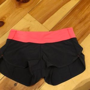 pink and dark grey lulu shorts